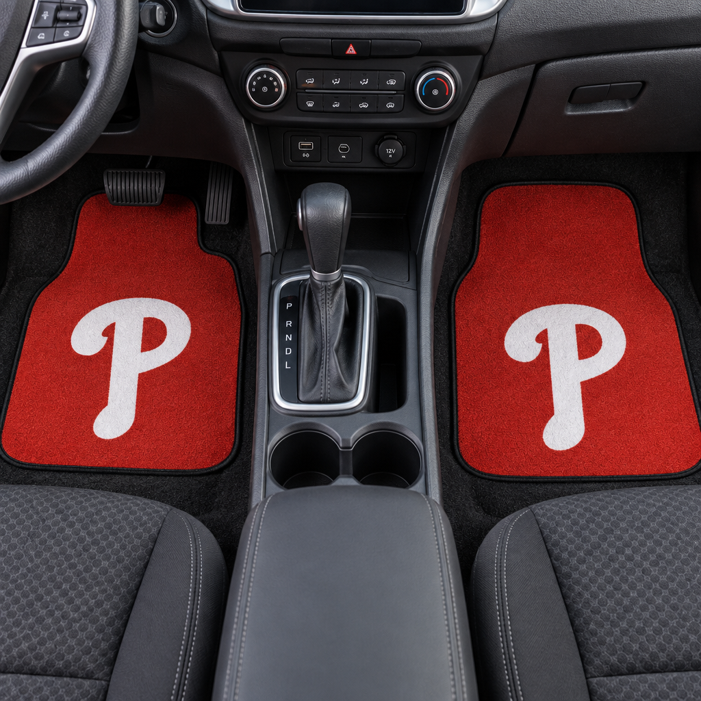 Two red car floor mats with white 'P' logo on a white background