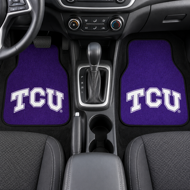 Two purple car mats with TCU logo on a white background